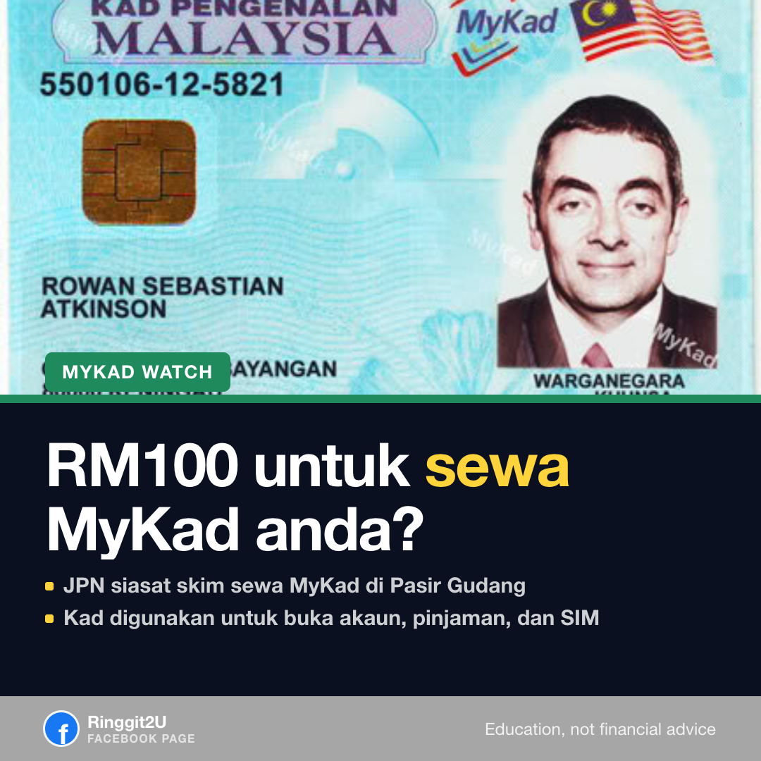 Kad pengenalan MyKad dipegang di tangan, dengan latar belakang kilang yang kabur