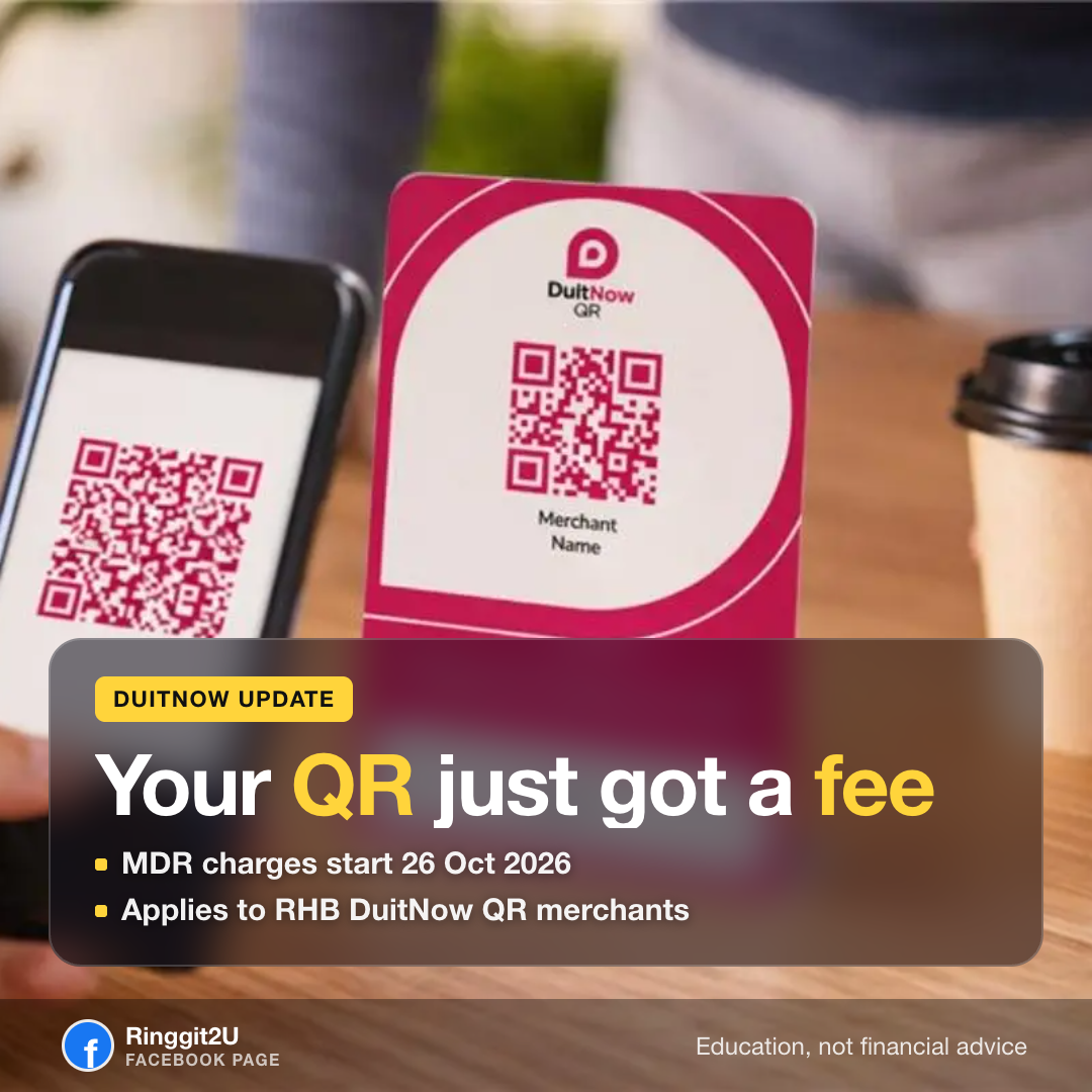 QR code payment at a Malaysian shop counter with a phone scanning