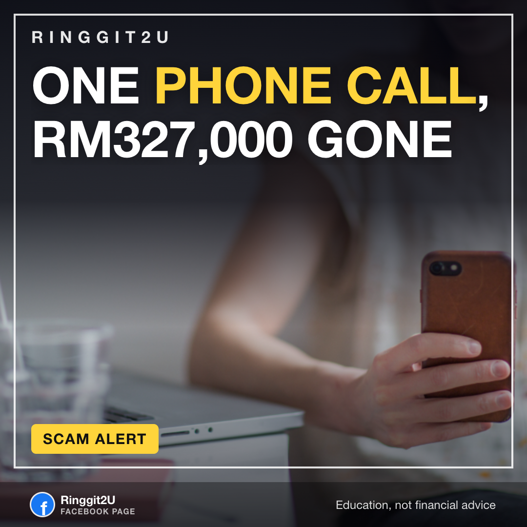 Office phone on a desk representing a phone scam that cost a Malaysian company RM327,000